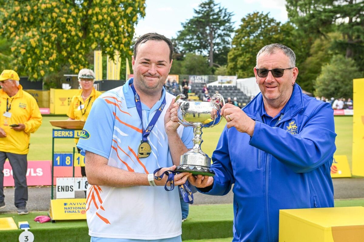 Elliott Winskill being presented with the Club Two Fours trophy at the 2025 Aviva National Bowls Finals